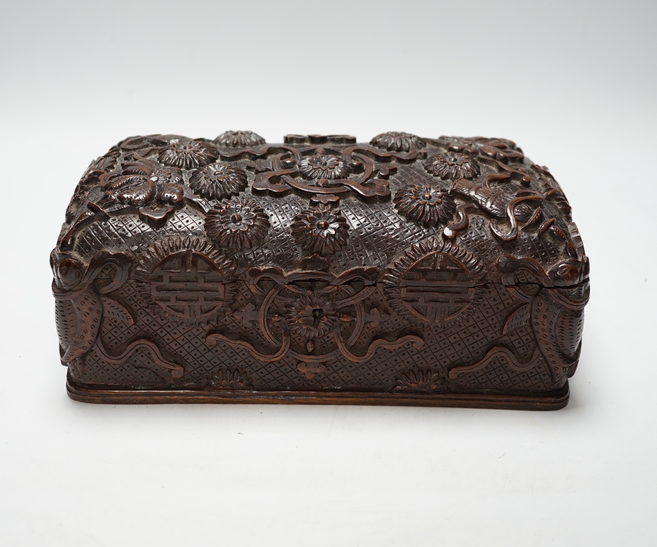 A Burmese carved teak box, early 20th century, 25cm wide x 13cm deep